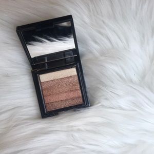 Bobbi Brown travel size highlighter in bronze